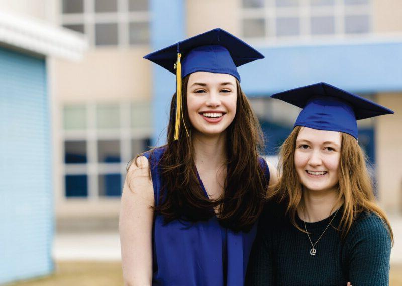 Maggie Zaverl, left, and Jane Menard, graduates of Monroe Catholic High School, received academic scholarships from GVEA in 2023.